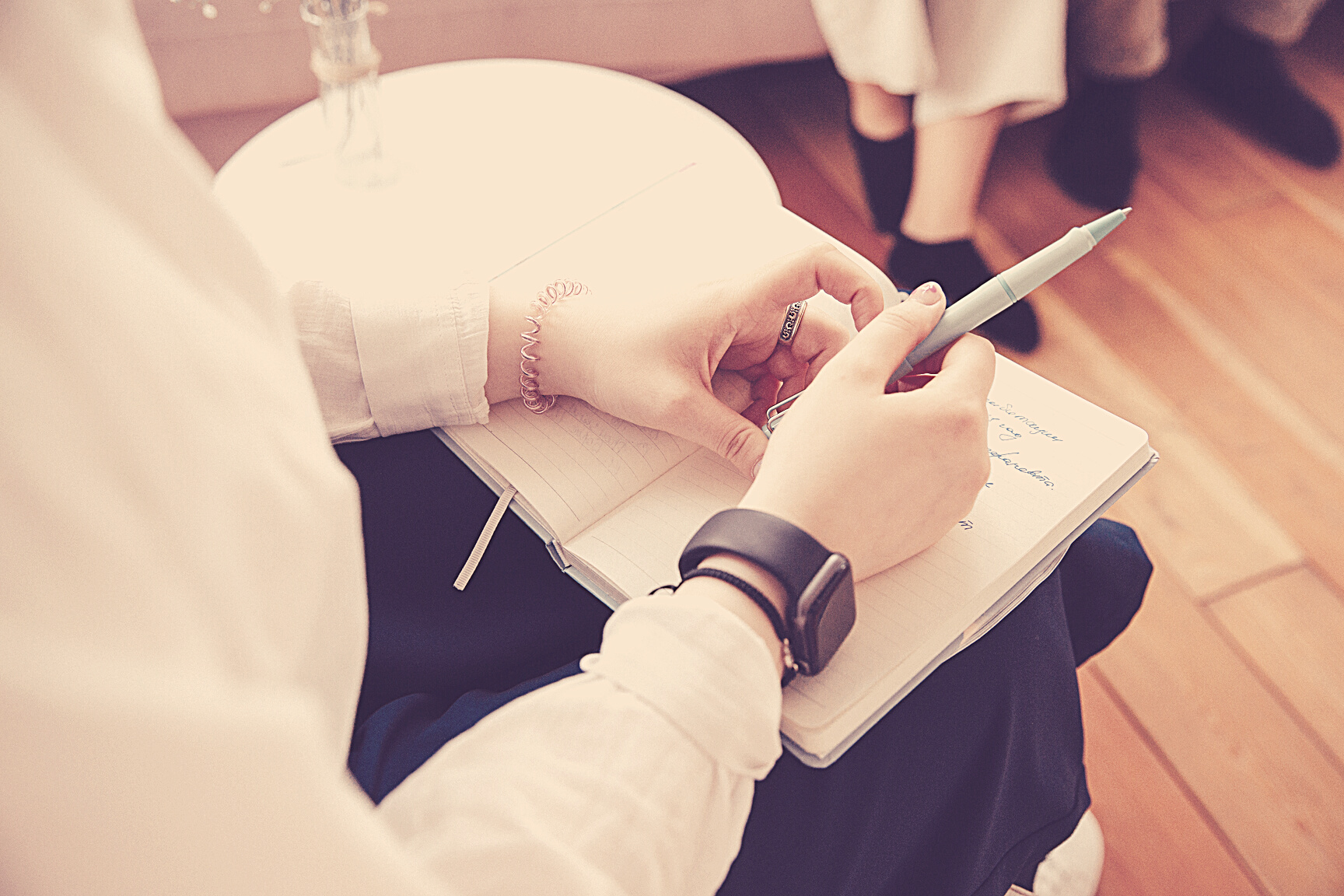 Close Up of Therapist Holding Notebook